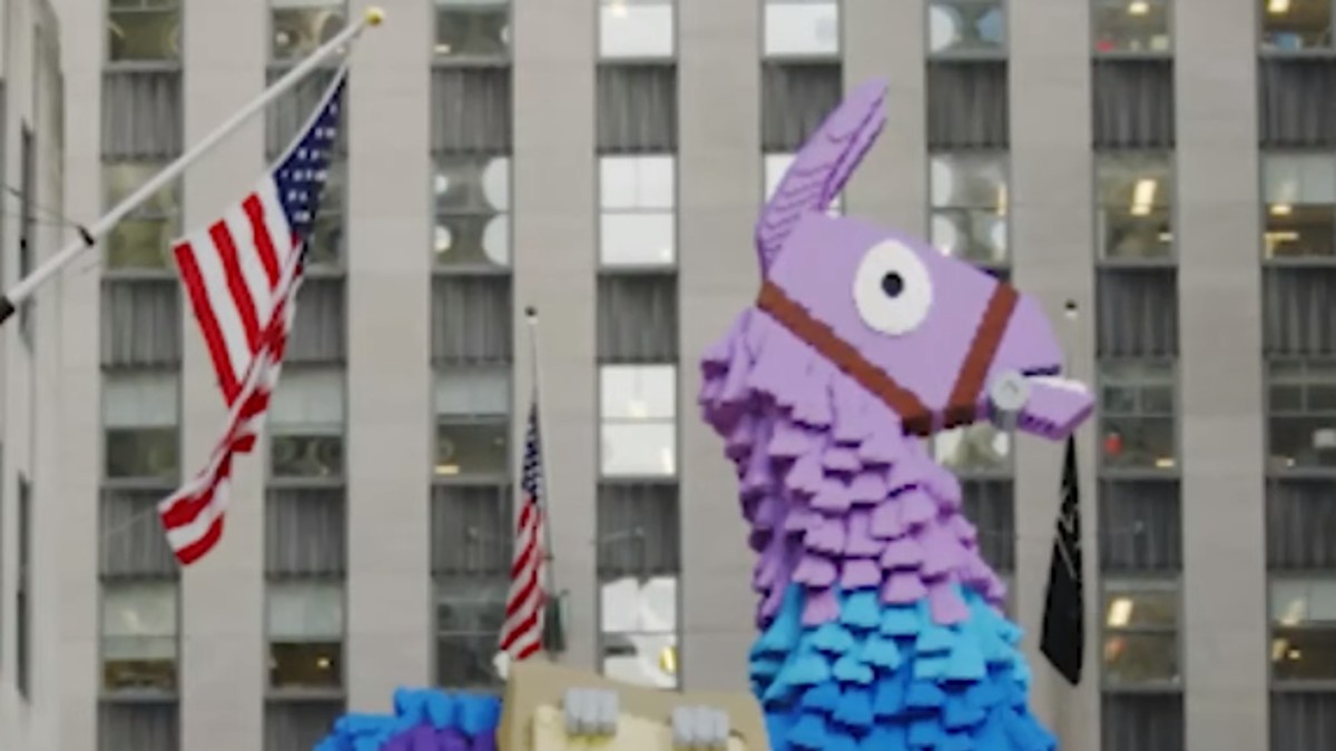 Behind the building of the giant LEGO Fortnite Llamas